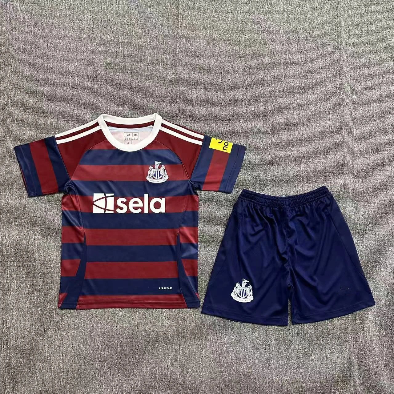 Newcastle United Kids Football Kit Maroon and Navy